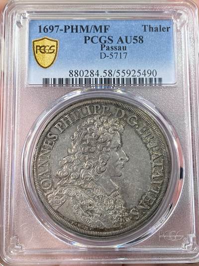 万国钱币拍卖第061期（马年首拍） - PCGS AU58 1697年神圣罗马帝国雷根斯堡帕绍教区约翰·菲利普·冯·兰贝格伯爵盾徽大泰勒 米勒造币厂铸 发行量仅2639枚的R级珍惜品种 十字架配皇冠的盾徽组合非常少见 原味欧陆淡五彩包浆 PCGS唯一冠军分顶级收藏品质