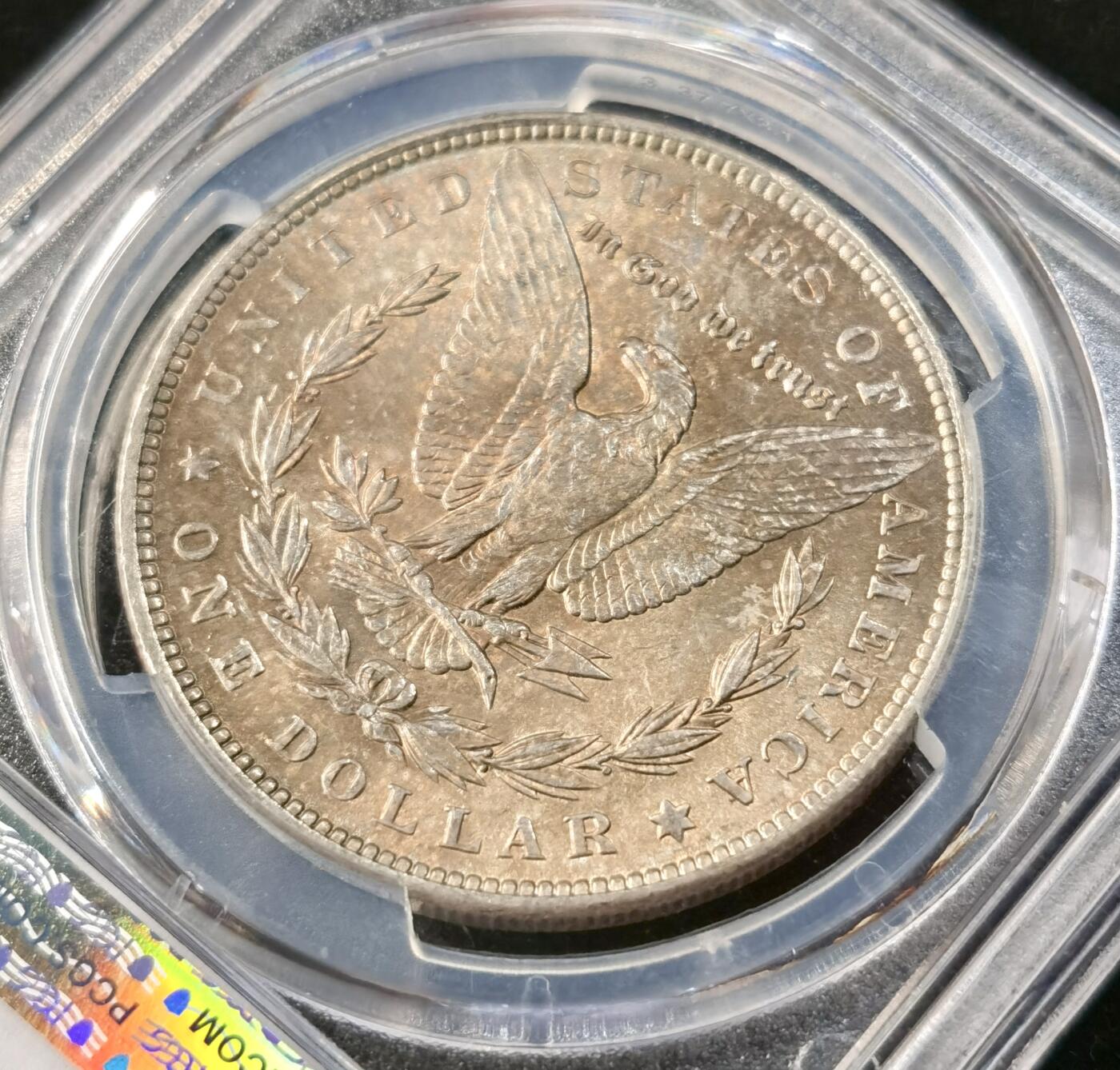 “福币呈祥”新年甄品场（直播拍卖）甄臻铺-世界币章拍卖（第50期），送拍享返佣金等优惠多多 PCGS-MS64 美国 1889年 摩根 银币 正面环彩带银霜 背面金彩带火烧云彩