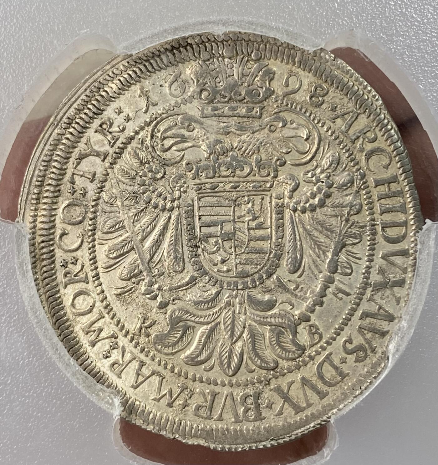 万国钱币拍卖第061期（马年首拍） PCGS AU55 1698年神圣罗马帝国匈牙利利奥波德一世双头鹰纹章大泰勒 克雷姆尼茨造币厂铸 非常罕见的早期大规格匈牙利泰勒 全深打原味银色光泽 PCGS唯一冠军 难得一见的收藏品质