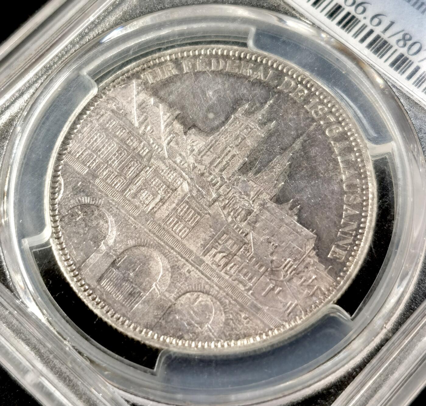 “福币呈祥”新年甄品场（直播拍卖）甄臻铺-世界币章拍卖（第50期），送拍享返佣金等优惠多多 PCGS-MS61 1876年瑞士洛桑射击节5法郎银币，紫罗兰包浆，背后的洛桑城景观细节一流，发行量20000枚，喜欢瑞射景观的不能错过的一枚。