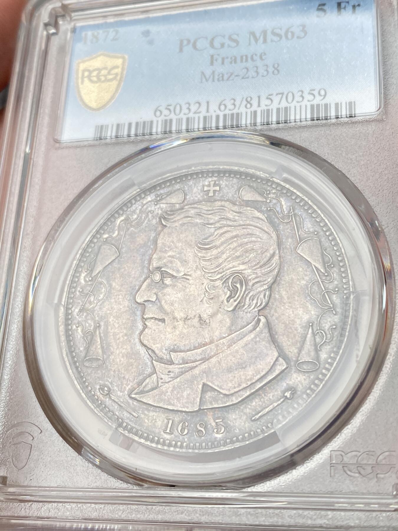 万国钱币拍卖第061期（马年首拍） PCGS MS63 1872年法国阿道夫·梯也尔5法郎银币 背面描绘了行刑队场景 橡树叶和月桂花环在周围 普法战争后拿破仑三世被俘 阿道夫·梯也尔出任法兰西第三共和国首任总统 罕见名誉品种收藏级品质 PC亚军分更高仅一枚