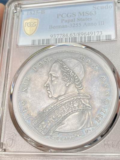 万国钱币拍卖第061期（马年首拍） PCGS MS63 1825年梵蒂冈教皇国里奥十二世斯库多大银 博洛尼亚造币厂铸 全深打教皇刻画入木三分 衣饰细节纤毫毕现 醇厚欧陆五彩环绕 极其难得的一枚收藏级早期教皇国大银