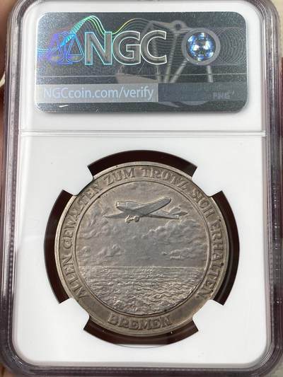 万国钱币拍卖第061期（马年首拍） NGC AUD 1928年德国不莱梅兄弟飞跃大西洋纪念银章 高浮雕原味酱黑彩