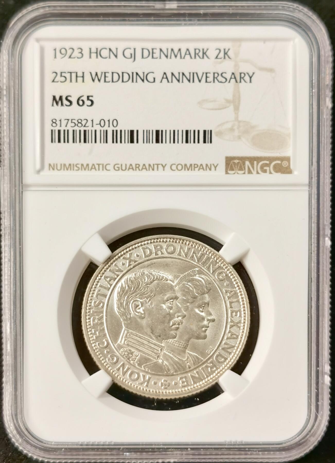 “福币呈祥”新年甄品场（直播拍卖）甄臻铺-世界币章拍卖（第50期），送拍享返佣金等优惠多多 NGC-MS65 1923年丹麦国王银婚纪念2克朗银币，转光耀眼，卷拆状态