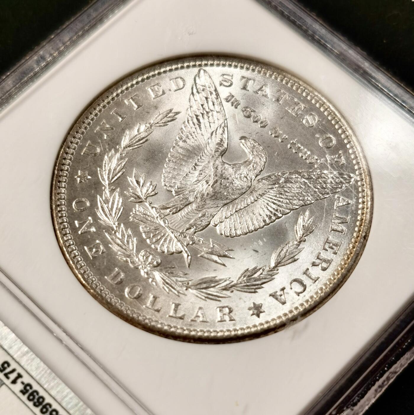 “福币呈祥”新年甄品场（直播拍卖）甄臻铺-世界币章拍卖（第50期），送拍享返佣金等优惠多多 NGC-MS63 美国1885年摩根一元银币，老盒子严评加小版再评，较少见