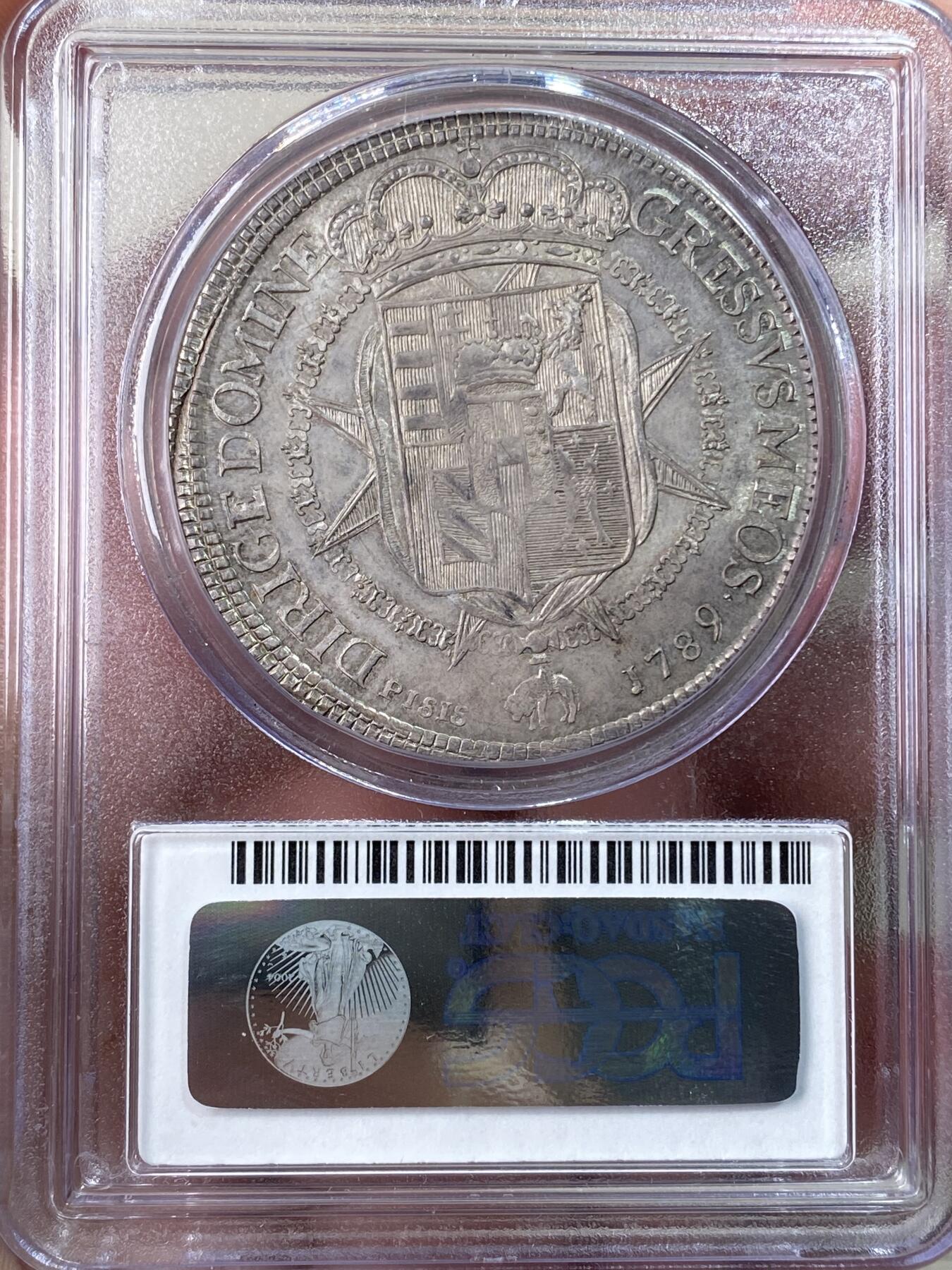 万国钱币拍卖第061期（马年首拍） PCGS MS64+ 1789年意大利托斯卡纳大公国利奥波德弗朗切斯科大银 正面为日后的神圣罗马帝国皇帝利奥波德二世身穿戎装佩戴金羊毛骑士团徽章 下方是一头灵动的独角兽 背面为繁复精美的奥地利托斯卡纳混合盾徽 极其原味的欧陆纸袋倒影包浆 丝绸转光地板 PCGS老评水晶盒唯一冠军分顶级收藏品质