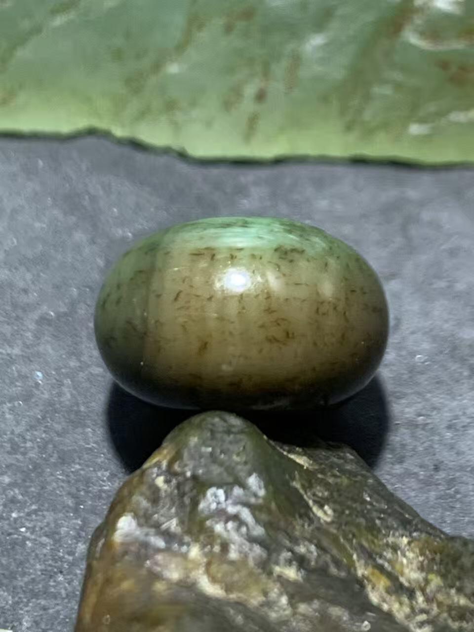 缠丝玛瑙算盘珠1颗，