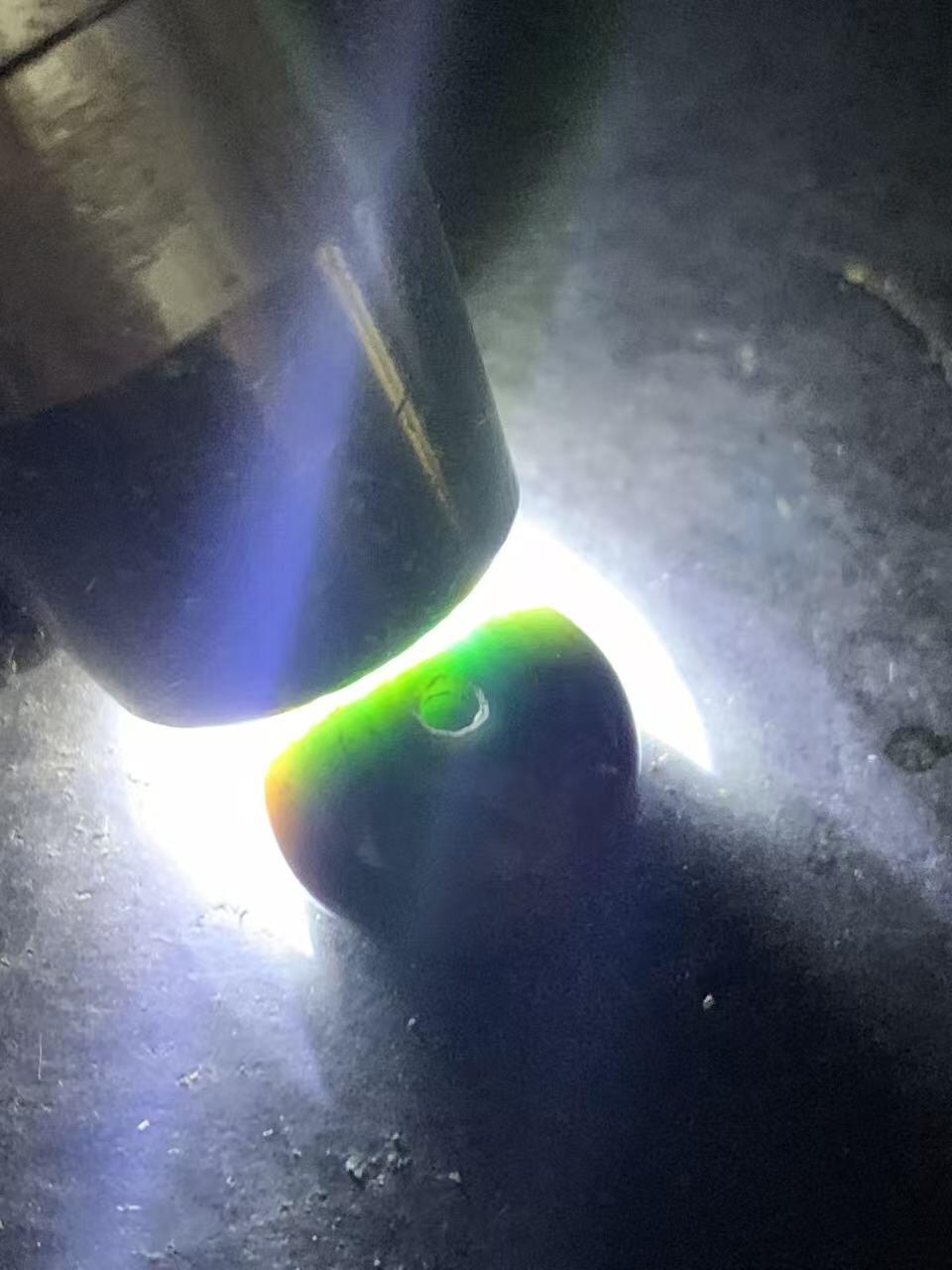 缠丝玛瑙算盘珠1颗，