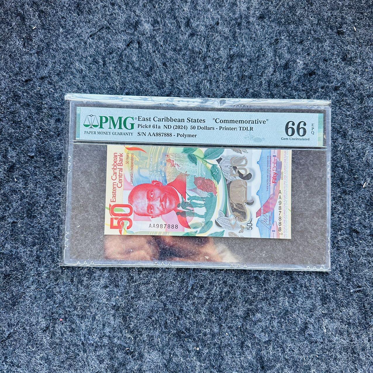 🇨🇳🇺🇳¥ ¥2026🐎新年塑料钞评级钞 东加勒比格林纳达2024年50元，纪念钞，AA首发冠+豹子号888，(AA987888)