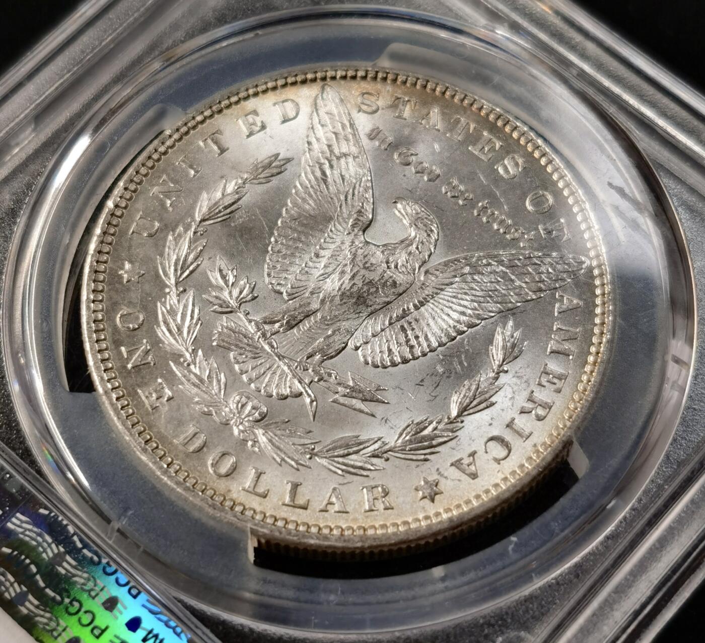 “福币呈祥”新年甄品场（直播拍卖）甄臻铺-世界币章拍卖（第50期），送拍享返佣金等优惠多多 PCGS-MS64 美国 1896年 摩根 银币 正面彩虹五彩包浆 背面环彩带银霜