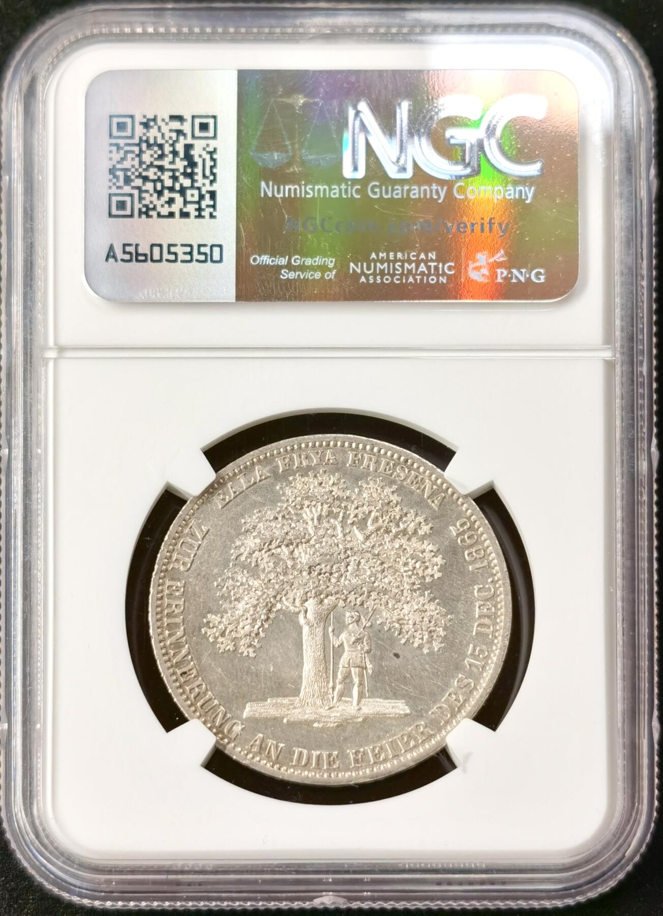 “福币呈祥”新年甄品场（直播拍卖）甄臻铺-世界币章拍卖（第50期），送拍享返佣金等优惠多多 NGC-MS61 1865年德意志汉诺威王朝弗里斯兰橡树泰勒，橡树叶一颗一颗如风中飘逸，人物盔甲几乎无磨损，细节饱满，个人认为严重低评，周围箴言“起来吧，自由的弗里斯兰人”，发行量才2000枚，卖一枚少一枚的存在，银价暴涨别错过。