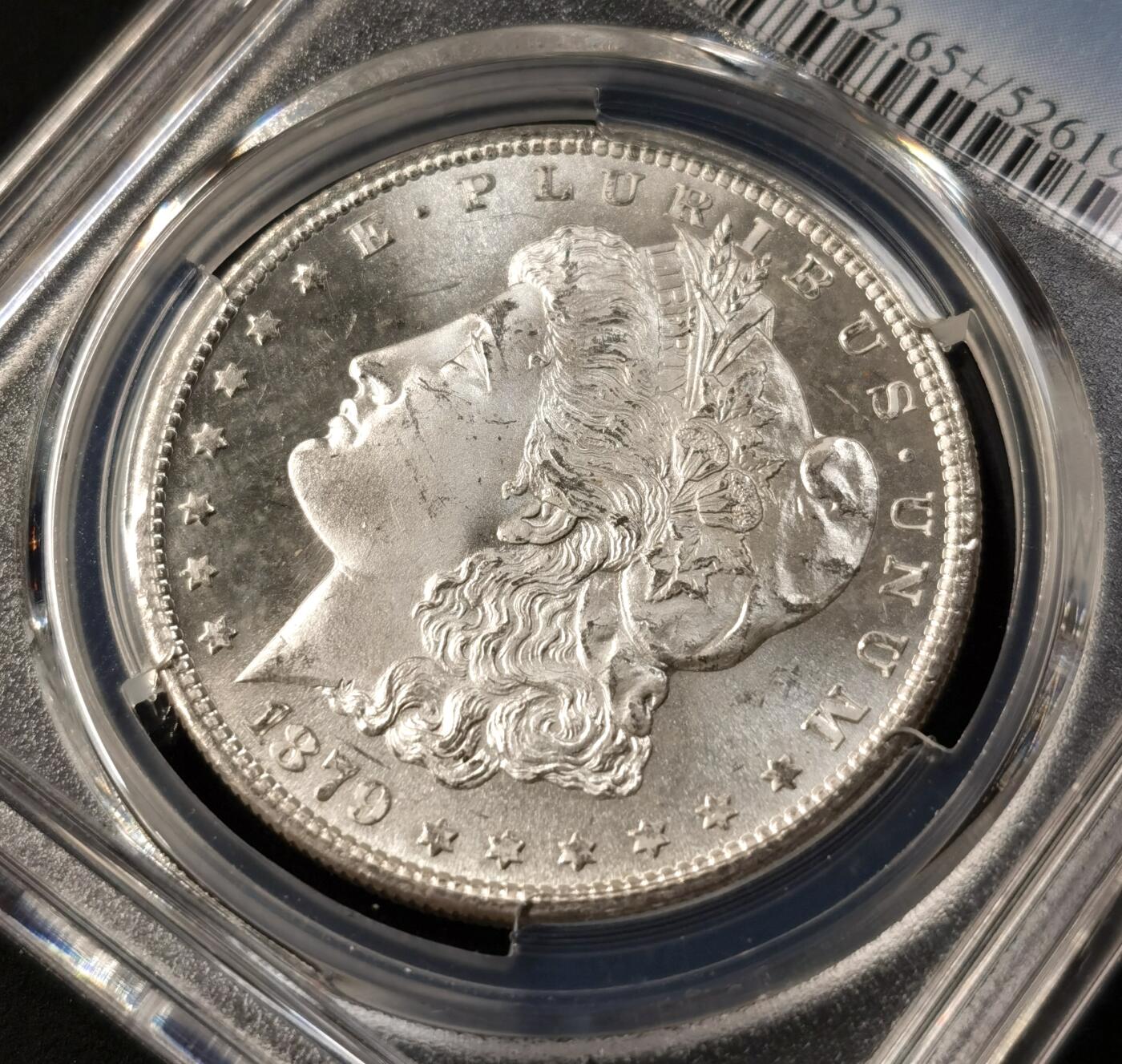 “福币呈祥”新年甄品场（直播拍卖）甄臻铺-世界币章拍卖（第50期），送拍享返佣金等优惠多多 PCGS-MS65+ 美国 1879年S 1美元 摩根 银币 镜面地板，丝滑转光