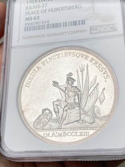 万国钱币拍卖第061期（马年首拍） NGC MS63 1763年尼德兰联省共和国巴黎合约纪念银章 44M 正面战神MARS收起利剑坐在战利品上 背面荷兰女神指向荷兰战舰标注坚定者和自由者 巴黎和约是1763年英、法、西班牙等国为结束七年战争而签订的和平条约 标志着欧洲列强在北美、印度等地殖民争霸的阶段性终结 顶级精铸镜面高浮雕喷砂收藏级品质 麦稀奇首拍超罕见品种