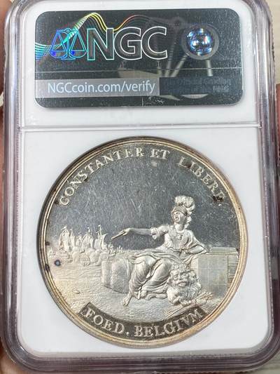 万国钱币拍卖第061期（马年首拍） NGC MS63 1763年尼德兰联省共和国巴黎合约纪念银章 44M 正面战神MARS收起利剑坐在战利品上 背面荷兰女神指向荷兰战舰标注坚定者和自由者 巴黎和约是1763年英、法、西班牙等国为结束七年战争而签订的和平条约 标志着欧洲列强在北美、印度等地殖民争霸的阶段性终结 顶级精铸镜面高浮雕喷砂收藏级品质 麦稀奇首拍超罕见品种