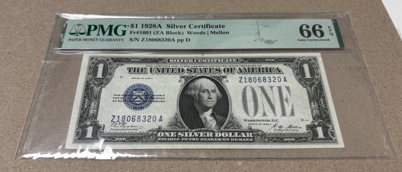 【礼羽收藏】🌏世界钱币拍卖125期 【银币券 稀少ZA冠 号码无457】1928年 1美元 PMG66EPQ