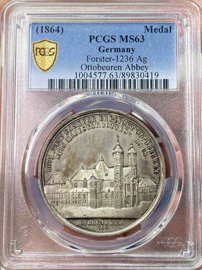 万国钱币拍卖第061期（马年首拍） - PCGS MS63 1864年德国巴伐利亚-施瓦本-奥托博伊伦本笃会修道院建成1100周年纪念银章 正面是具有3D视觉感的修道院景观 背面是圣母抱婴像 极罕见品种 优雅天鹅绒彩环绕 PCGS唯一冠军分 顶级收藏品质