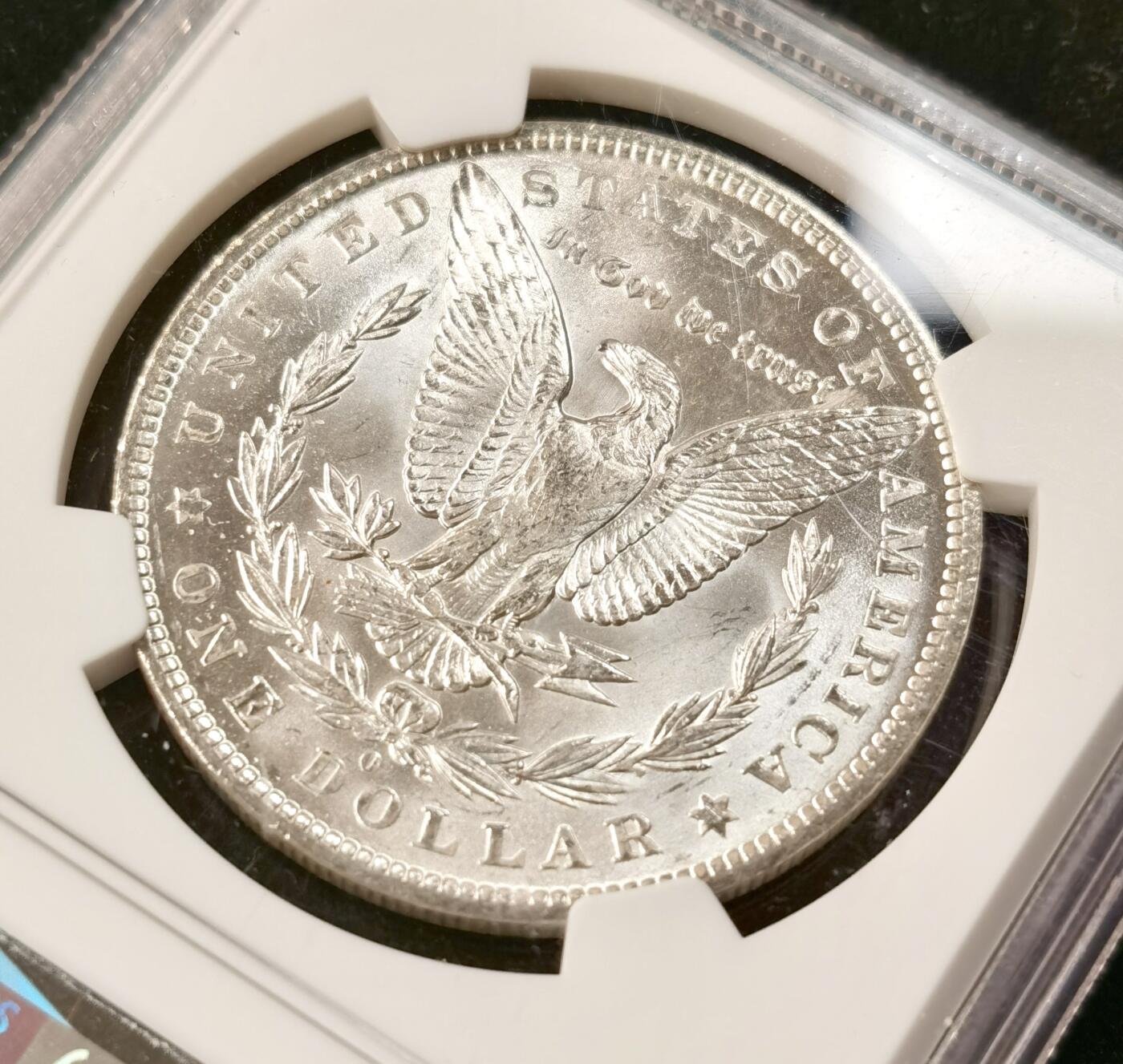 “福币呈祥”新年甄品场（直播拍卖）甄臻铺-世界币章拍卖（第50期），送拍享返佣金等优惠多多 NGC-MS64 美国1883年O版摩根一元银币，正面轻微淡彩