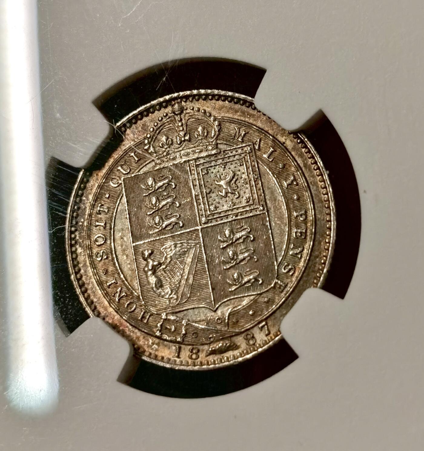 “福币呈祥”新年甄品场（直播拍卖）甄臻铺-世界币章拍卖（第50期），送拍享返佣金等优惠多多 NGC-MS65 英国 1887年 1S JUBILEE HEAD先令 银币 高冠维多利亚女王 双面淡彩金光充盈 深银包浆漂亮 难得高分