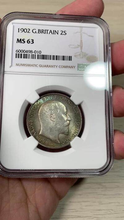 万国钱币拍卖第061期（马年首拍） NGC MS63 1902年英国爱德华七世海神2先令 十字转光孔雀绿环彩非常漂亮 