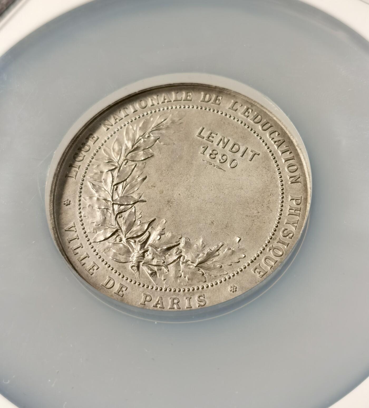 “福币呈祥”新年甄品场（直播拍卖）甄臻铺-世界币章拍卖（第50期），送拍享返佣金等优惠多多 NGC-MS62 法国 1890 镀银铜章牌 自由帽玛丽安娜国家体育教育奖章 稀少 直径50.8mm，53.4g 边铭丰饶角+MAILLECHORT