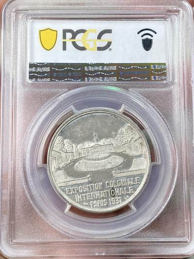 万国钱币拍卖第061期（马年首拍） PCGS SP63 1931年法国巴黎国际殖民博览会美洲印第安人纪念镀银铜章 印第安人头像和场馆景观非常漂亮 精铸镜面