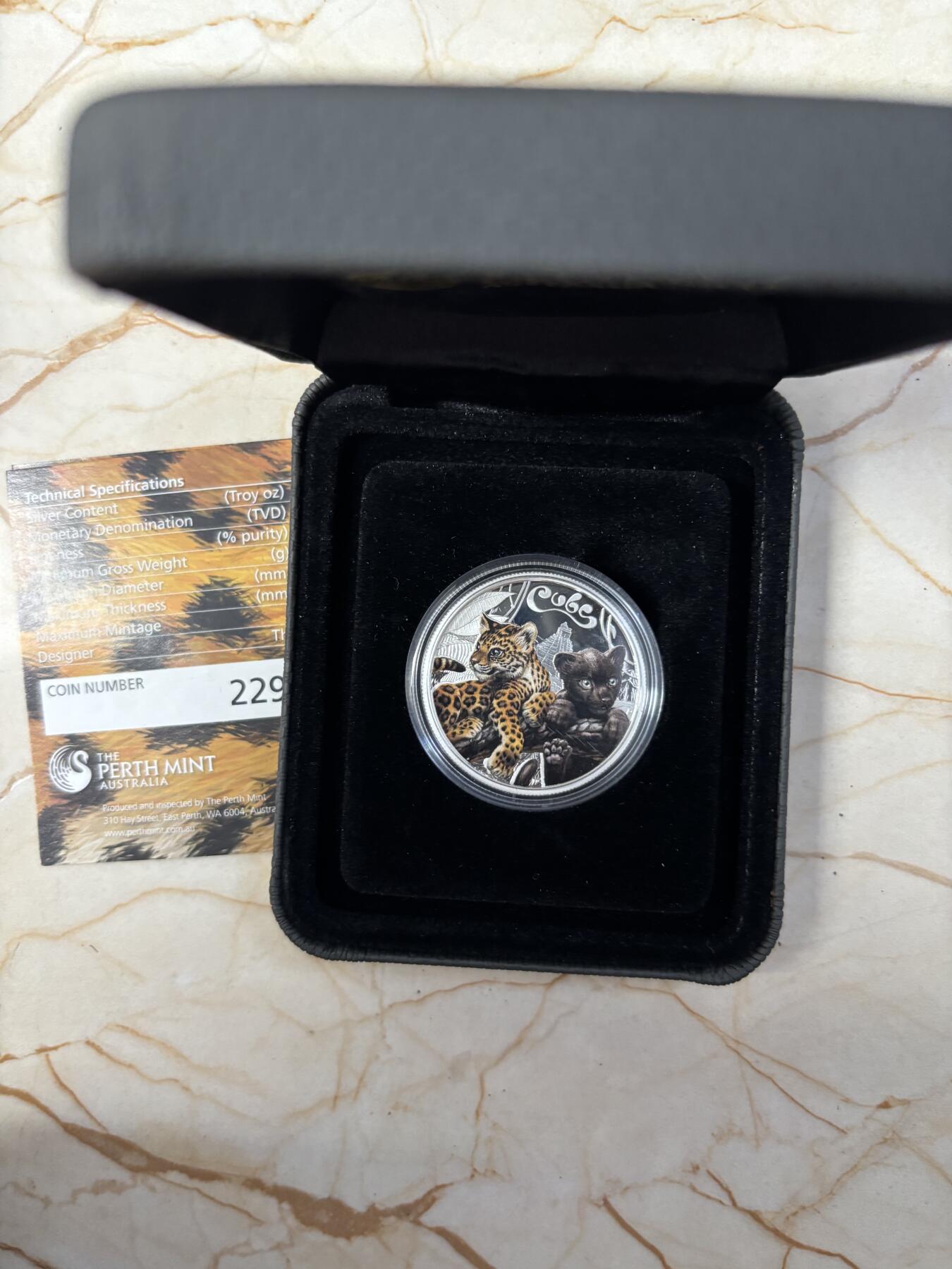 第191期拍卖 图瓦卢2016年幼崽系列美洲虎半盎司彩色纪念银币，999银，发行5000枚