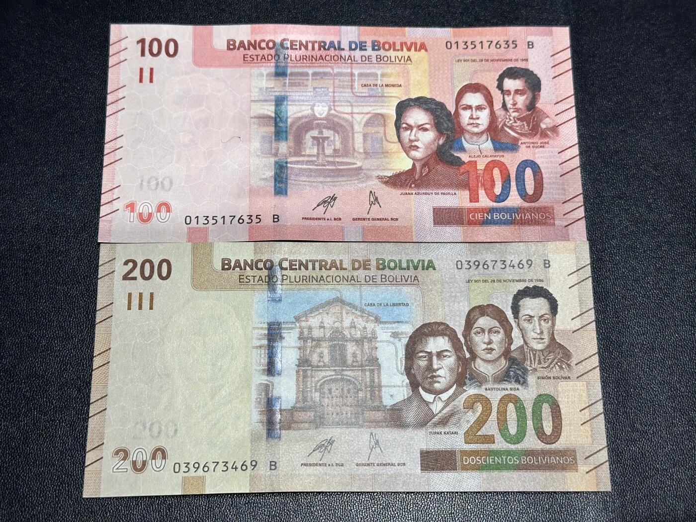 《外钞收藏家》第六百一十一期（农历新年第一场/快递恢复正常再发货）（长期征集拍品、欢迎藏友们联系合作） 玻利维亚100和200面额 2张一起 全新 尾（35、69）