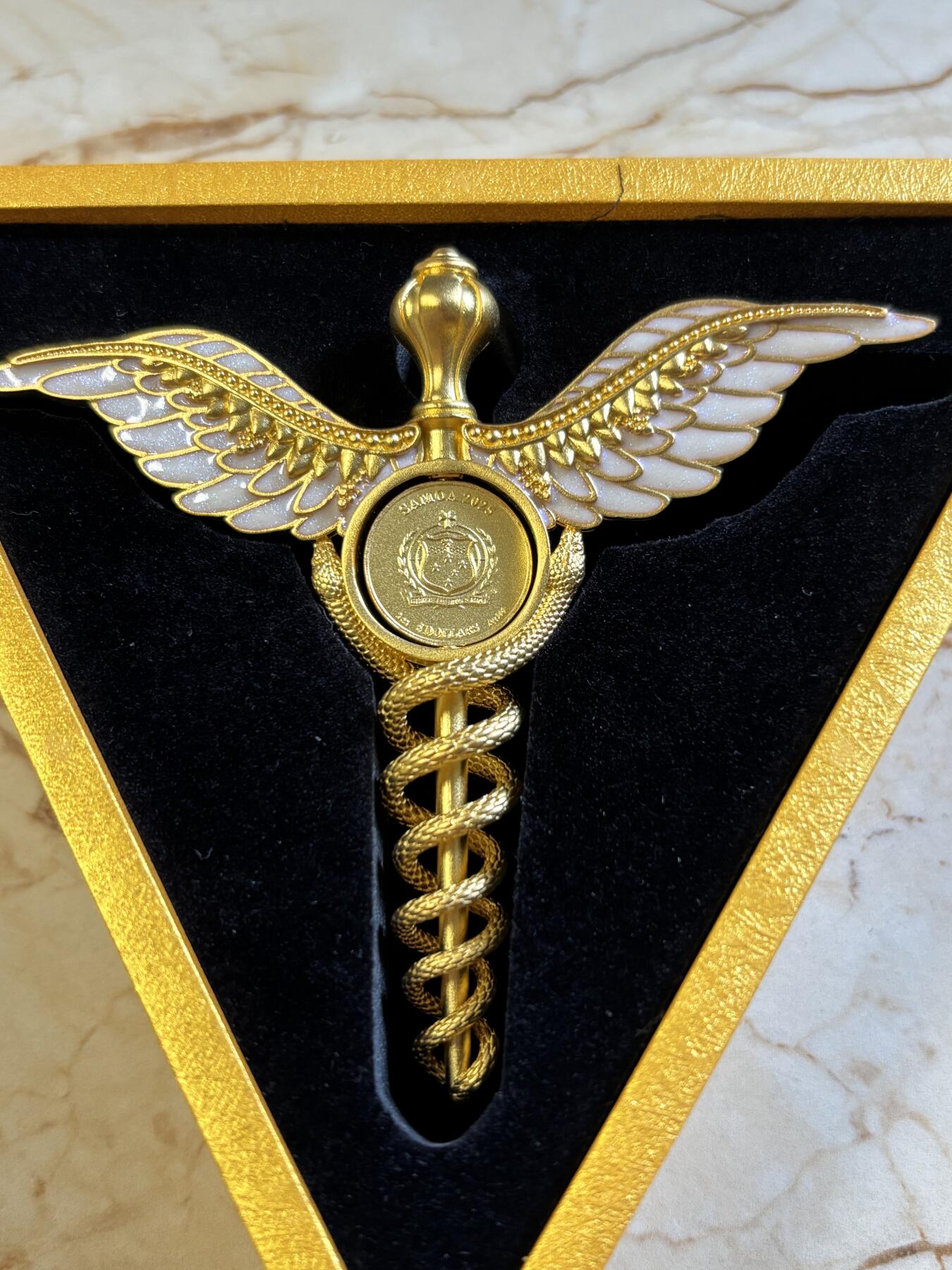 第191期拍卖 萨摩亚2025年墨丘利双蛇权杖2盎司银币中间可翻转，999银，发行699枚