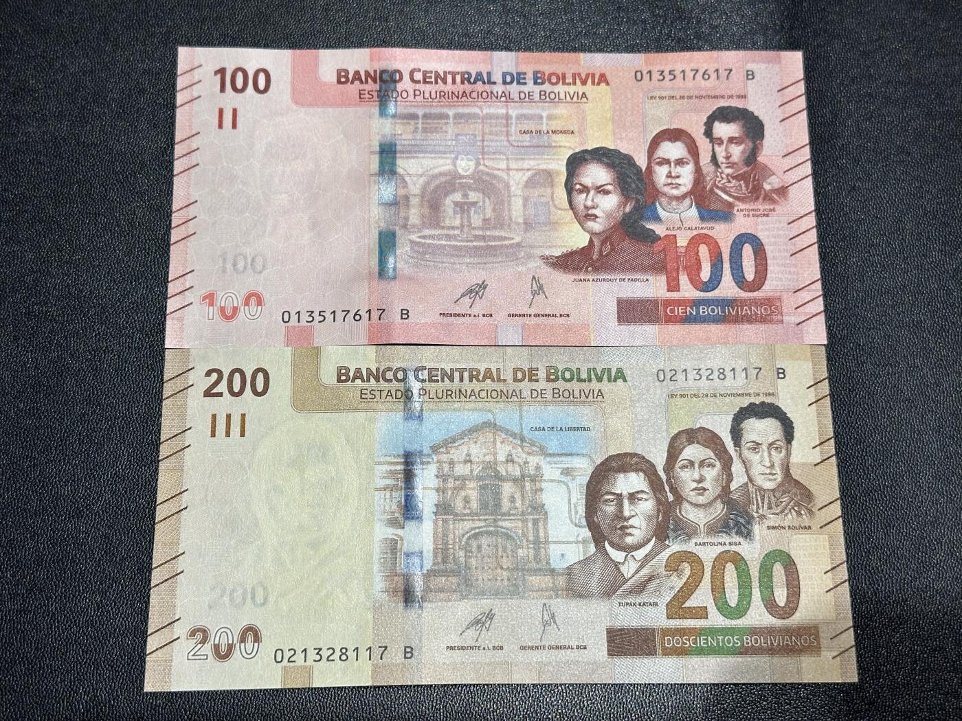 《外钞收藏家》第六百一十一期（农历新年第一场/快递恢复正常再发货）（长期征集拍品、欢迎藏友们联系合作） 玻利维亚100和200面额 2张一起 全新 尾（17）