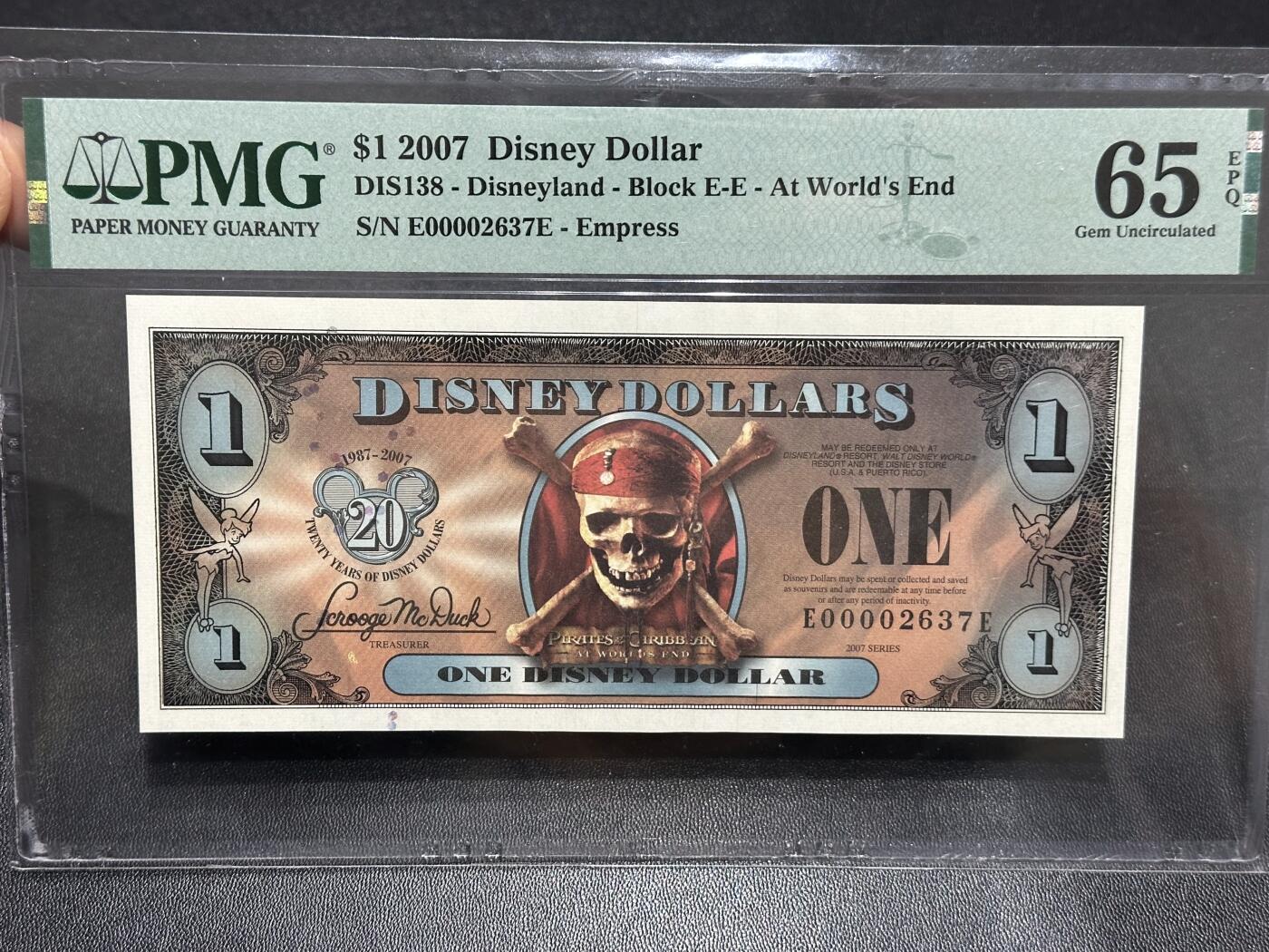 《外钞收藏家》第六百一十一期（农历新年第一场/快递恢复正常再发货）（长期征集拍品、欢迎藏友们联系合作）  迪士尼2007年加勒比海盗1美元，无4千位小号，Empress女皇号 PMG65!