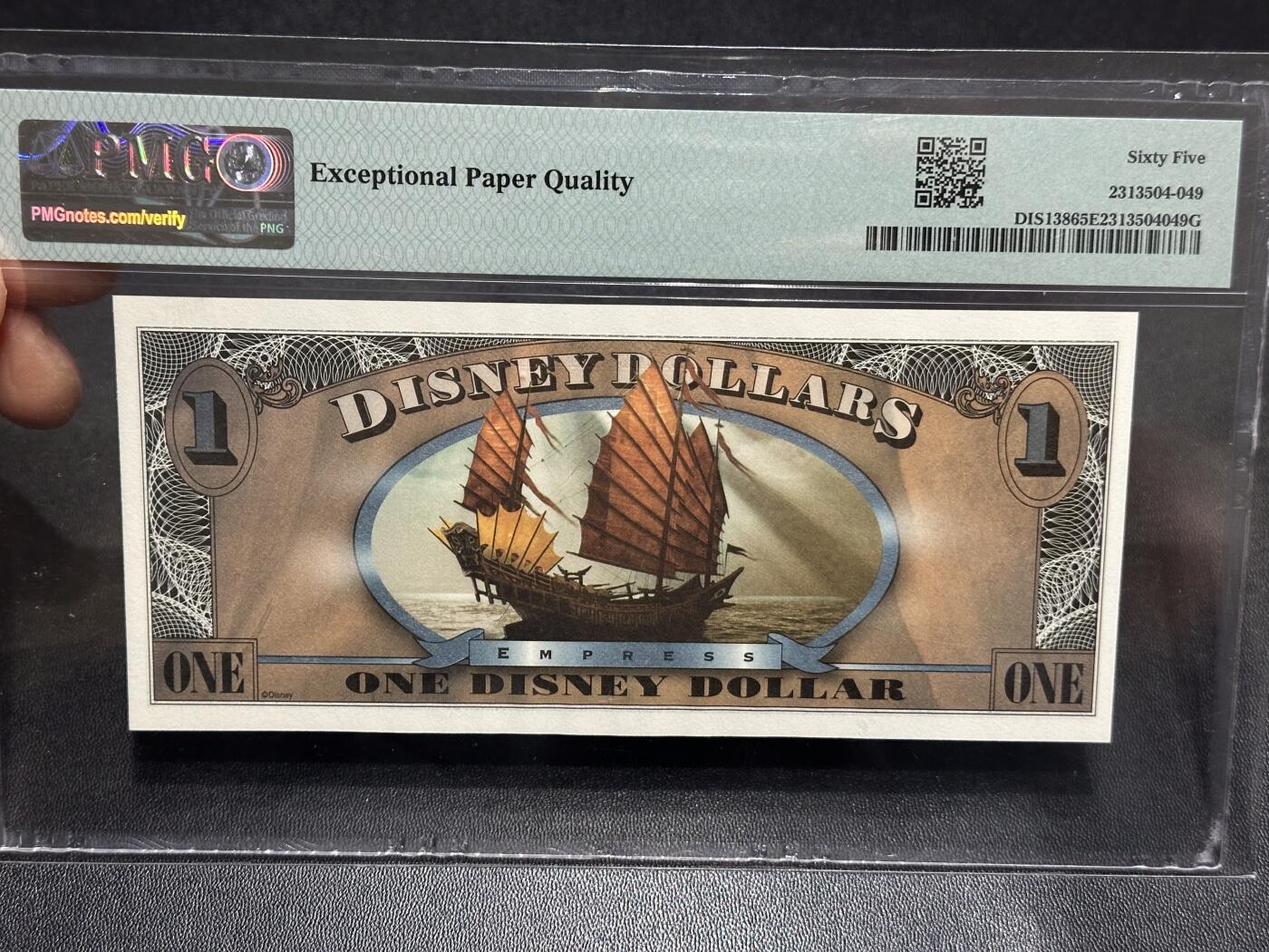《外钞收藏家》第六百一十一期（农历新年第一场/快递恢复正常再发货）（长期征集拍品、欢迎藏友们联系合作）  迪士尼2007年加勒比海盗1美元，无4千位小号，Empress女皇号 PMG65!