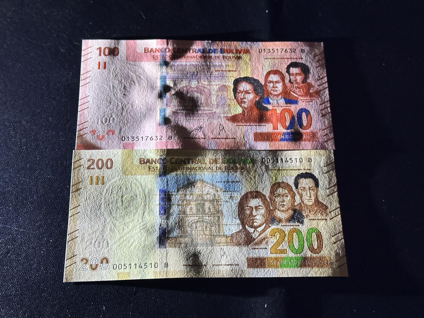 《外钞收藏家》第六百一十一期（农历新年第一场/快递恢复正常再发货）（长期征集拍品、欢迎藏友们联系合作） 玻利维亚100和200面额 2张一起 全新 尾（32、10）
