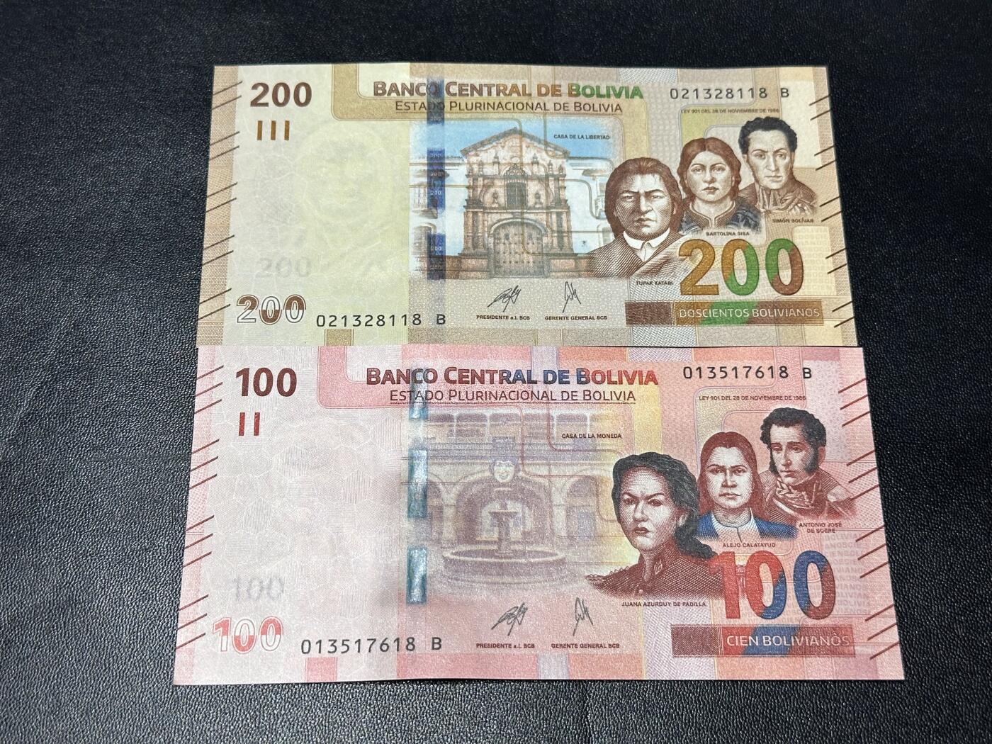 《外钞收藏家》第六百一十一期（农历新年第一场/快递恢复正常再发货）（长期征集拍品、欢迎藏友们联系合作） 玻利维亚100和200面额 2张一起 全新 尾（18）