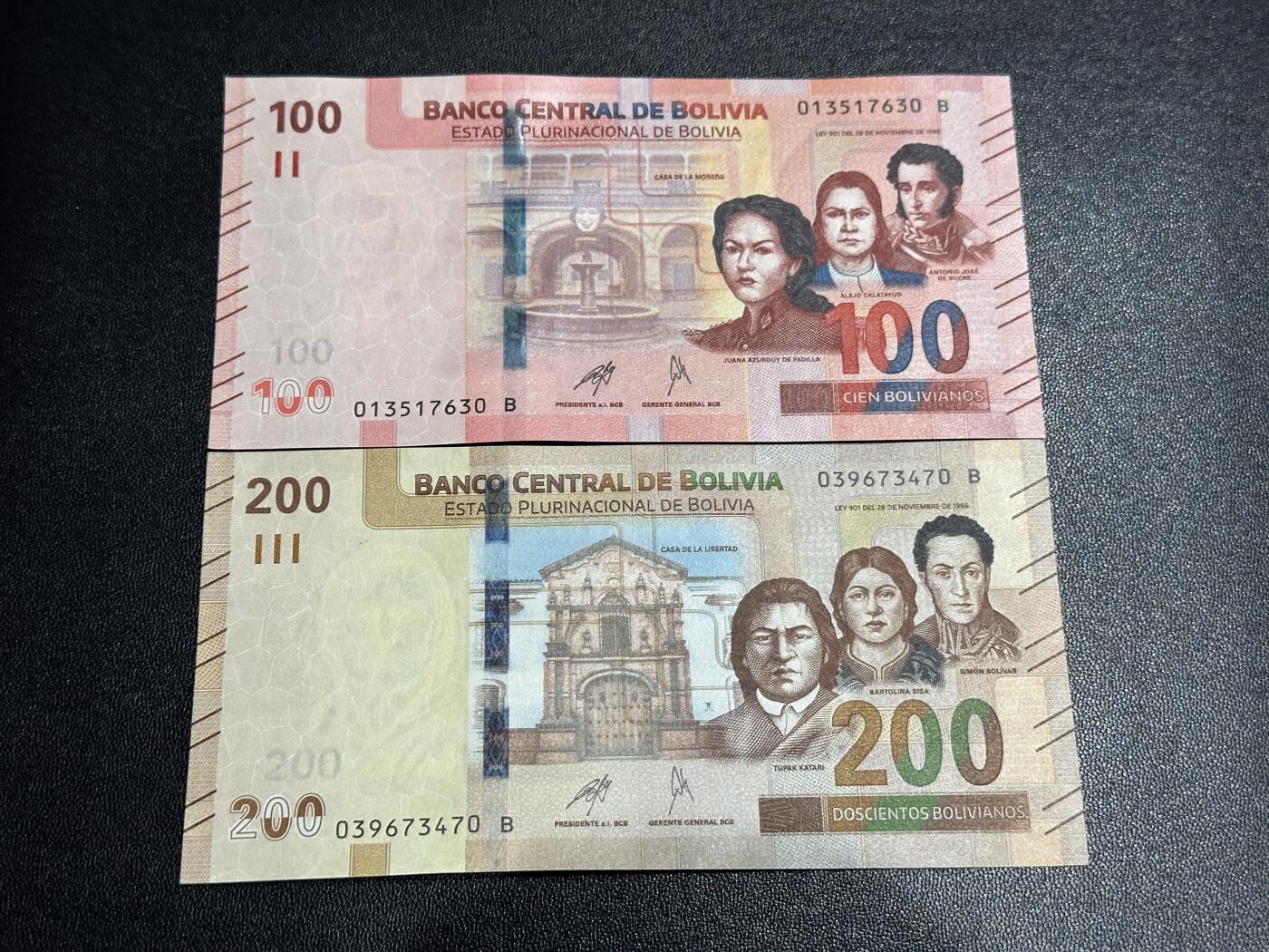 《外钞收藏家》第六百一十一期（农历新年第一场/快递恢复正常再发货）（长期征集拍品、欢迎藏友们联系合作） 玻利维亚100和200面额 2张一起 全新 尾（30、70）