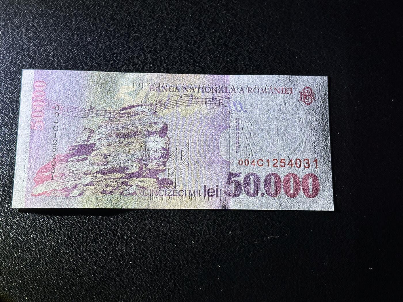 《外钞收藏家》第六百一十一期（农历新年第一场/快递恢复正常再发货）（长期征集拍品、欢迎藏友们联系合作） 2000年罗马尼亚5万全新角不绝+2001年10万塑料钞全新