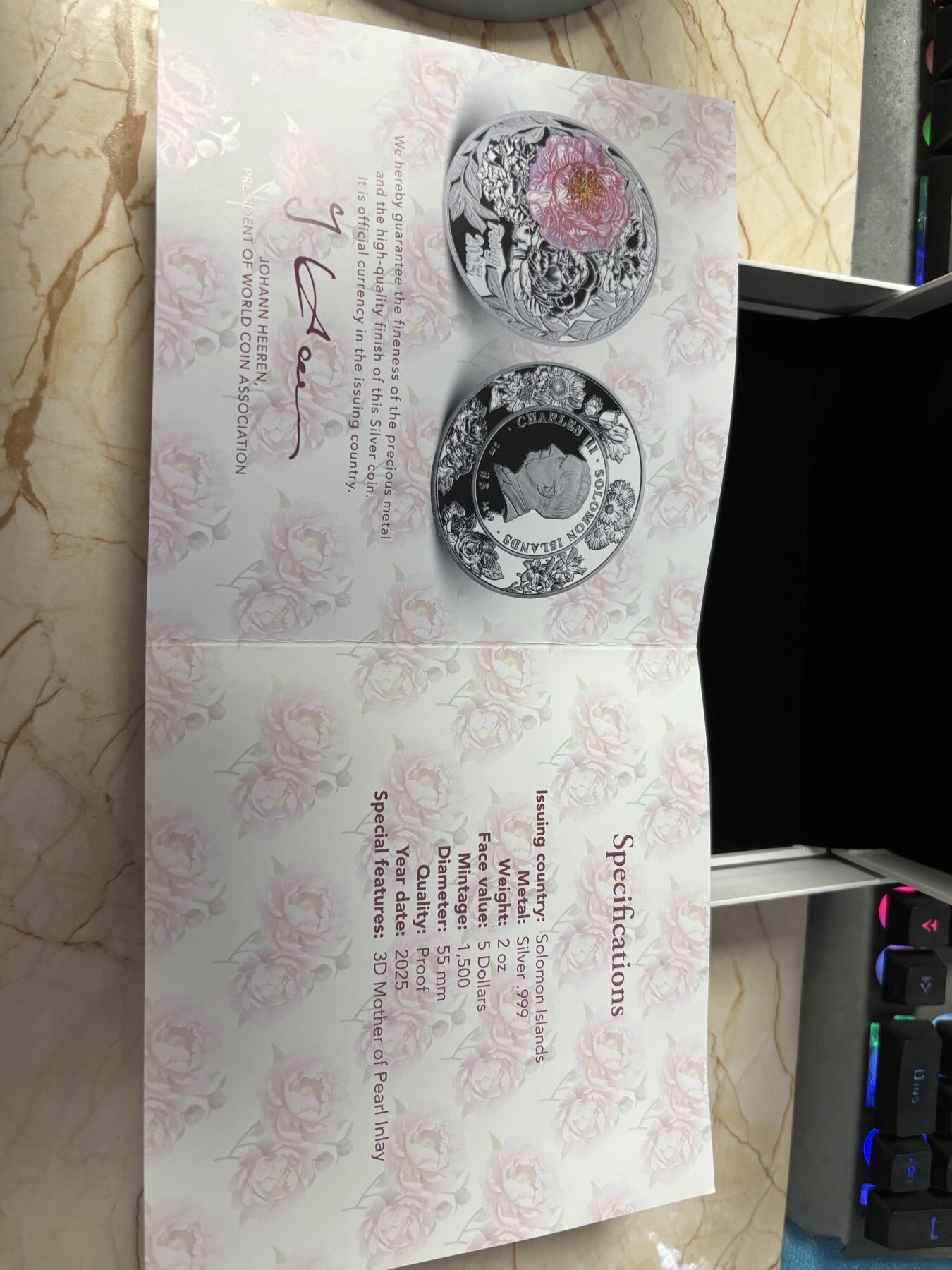 第191期拍卖 所罗门2025年镶嵌牡丹花2盎司纪念银币，999银，发行1500枚