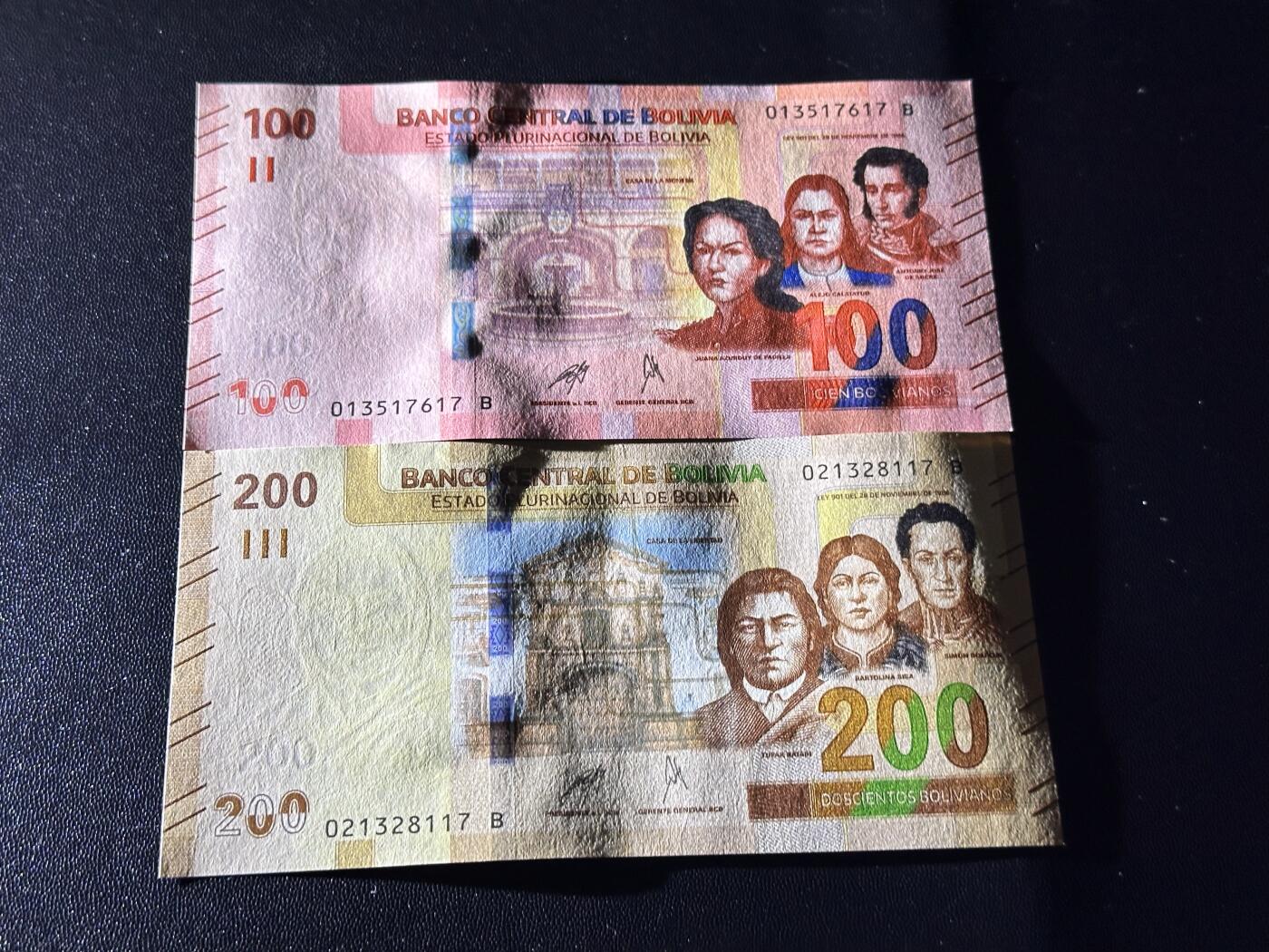 《外钞收藏家》第六百一十一期（农历新年第一场/快递恢复正常再发货）（长期征集拍品、欢迎藏友们联系合作） 玻利维亚100和200面额 2张一起 全新 尾（17）