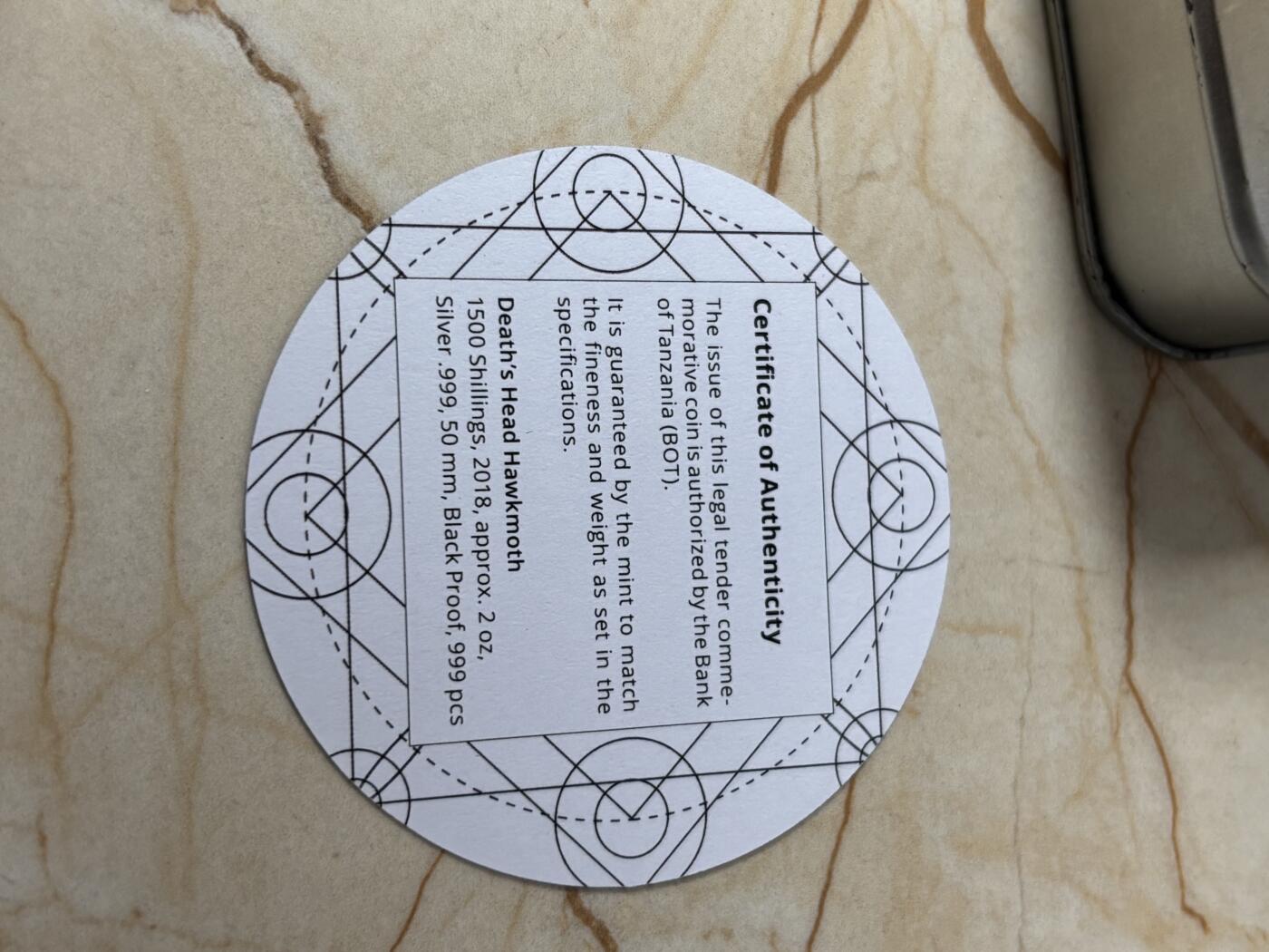 第191期拍卖 坦桑尼亚2018年鬼脸天蛾2盎司纪念银币，999银，发行999枚，塑料盒有破