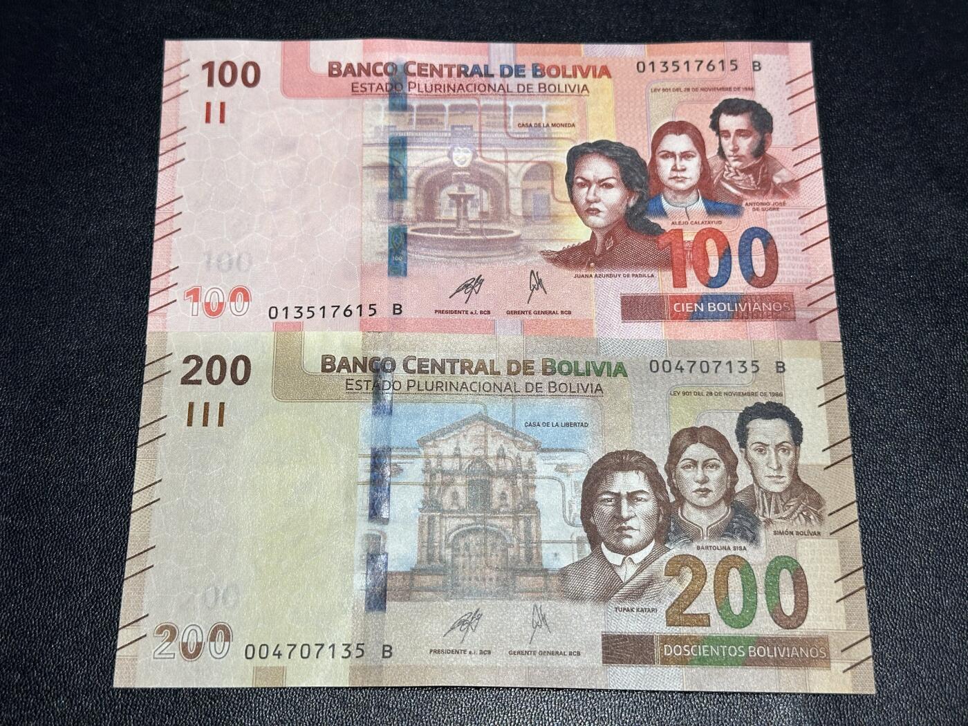 《外钞收藏家》第六百一十一期（农历新年第一场/快递恢复正常再发货）（长期征集拍品、欢迎藏友们联系合作） 玻利维亚100和200面额 2张一起 全新 尾（15、35）