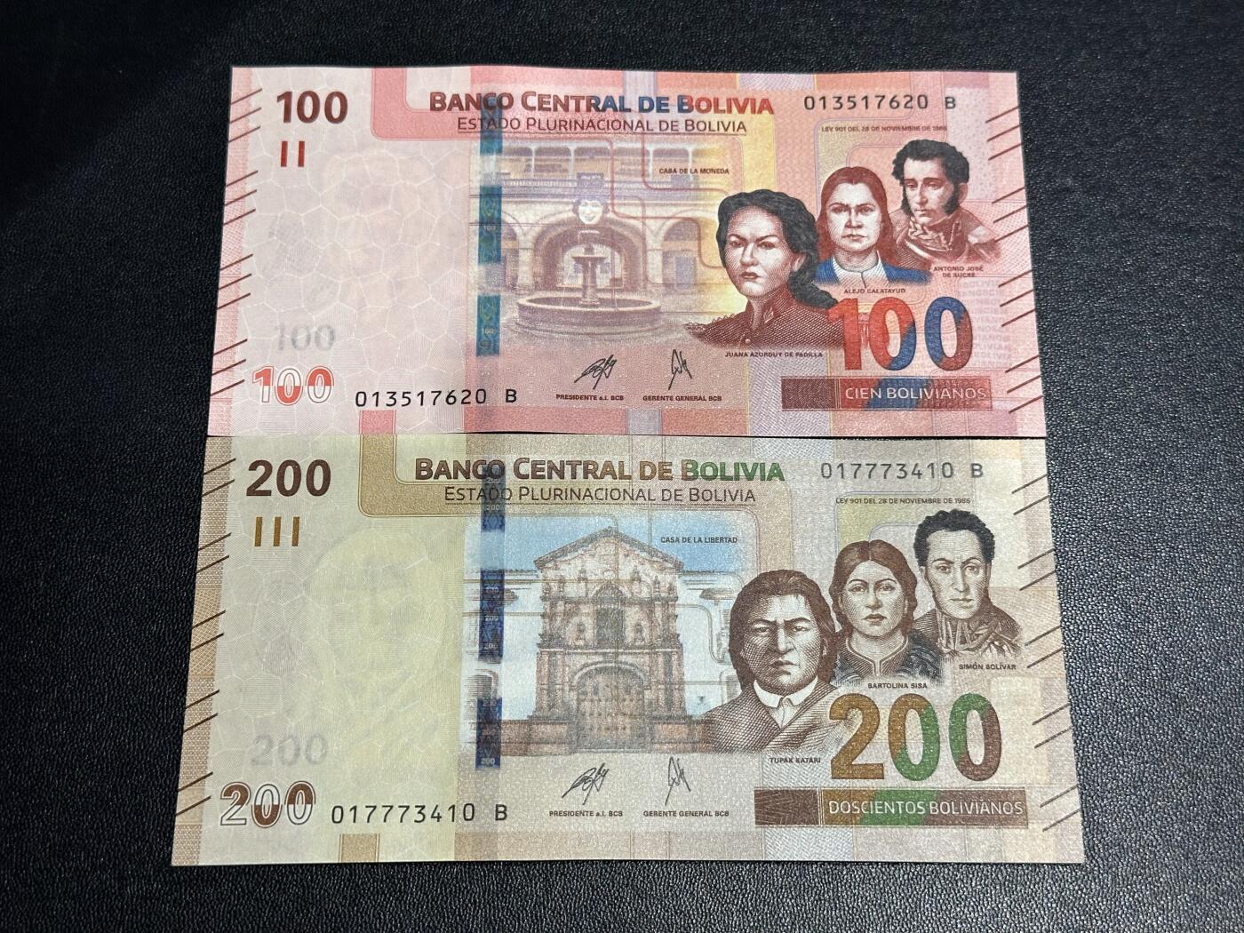 《外钞收藏家》第六百一十一期（农历新年第一场/快递恢复正常再发货）（长期征集拍品、欢迎藏友们联系合作） 玻利维亚100和200面额 2张一起 全新 尾（20、10）一个角不绝