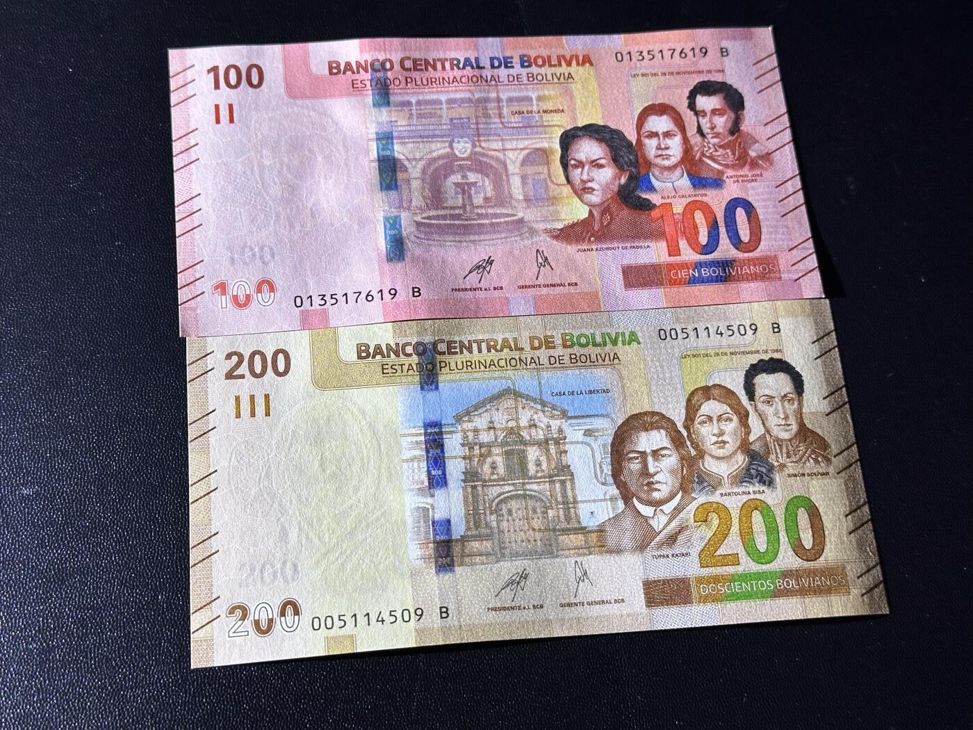 《外钞收藏家》第六百一十一期（农历新年第一场/快递恢复正常再发货）（长期征集拍品、欢迎藏友们联系合作） 玻利维亚100和200面额 2张一起 全新 尾（19、09）