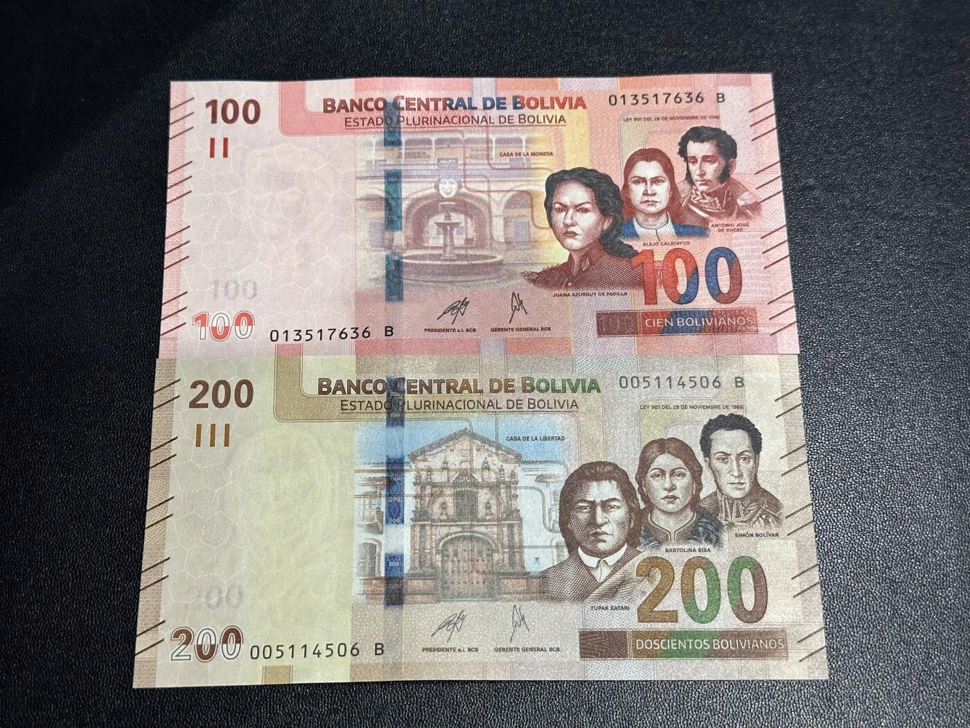 《外钞收藏家》第六百一十一期（农历新年第一场/快递恢复正常再发货）（长期征集拍品、欢迎藏友们联系合作） 玻利维亚100和200面额 2张一起 全新 尾（36、06）