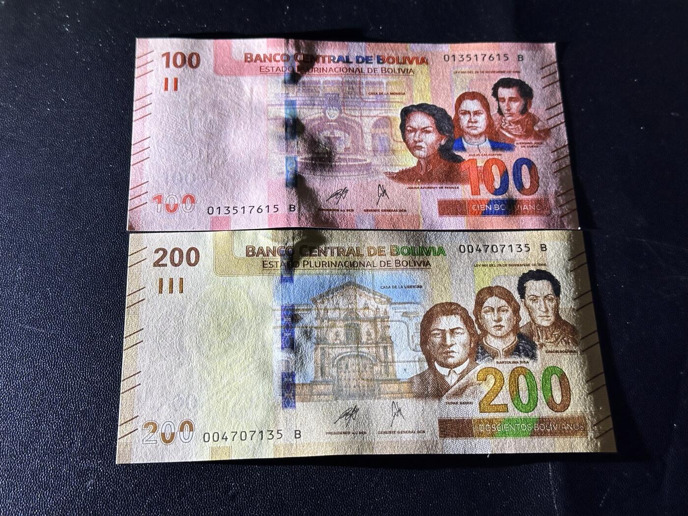 《外钞收藏家》第六百一十一期（农历新年第一场/快递恢复正常再发货）（长期征集拍品、欢迎藏友们联系合作） 玻利维亚100和200面额 2张一起 全新 尾（15、35）