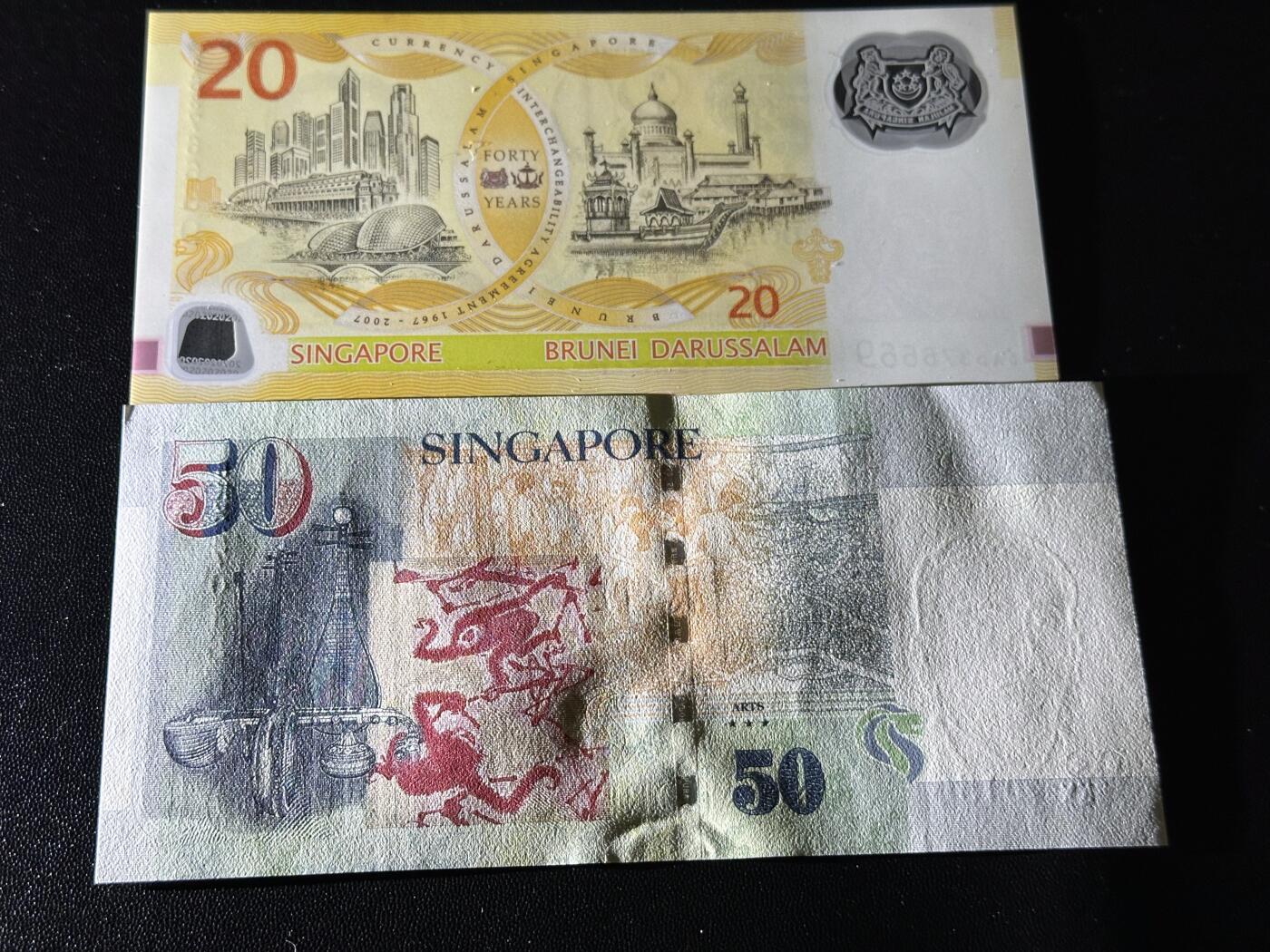 《外钞收藏家》第六百一十一期（农历新年第一场/快递恢复正常再发货）（长期征集拍品、欢迎藏友们联系合作） 新加坡20元 等值协议40周年纪念钞全新+人像纸币版50元全新一个角不绝