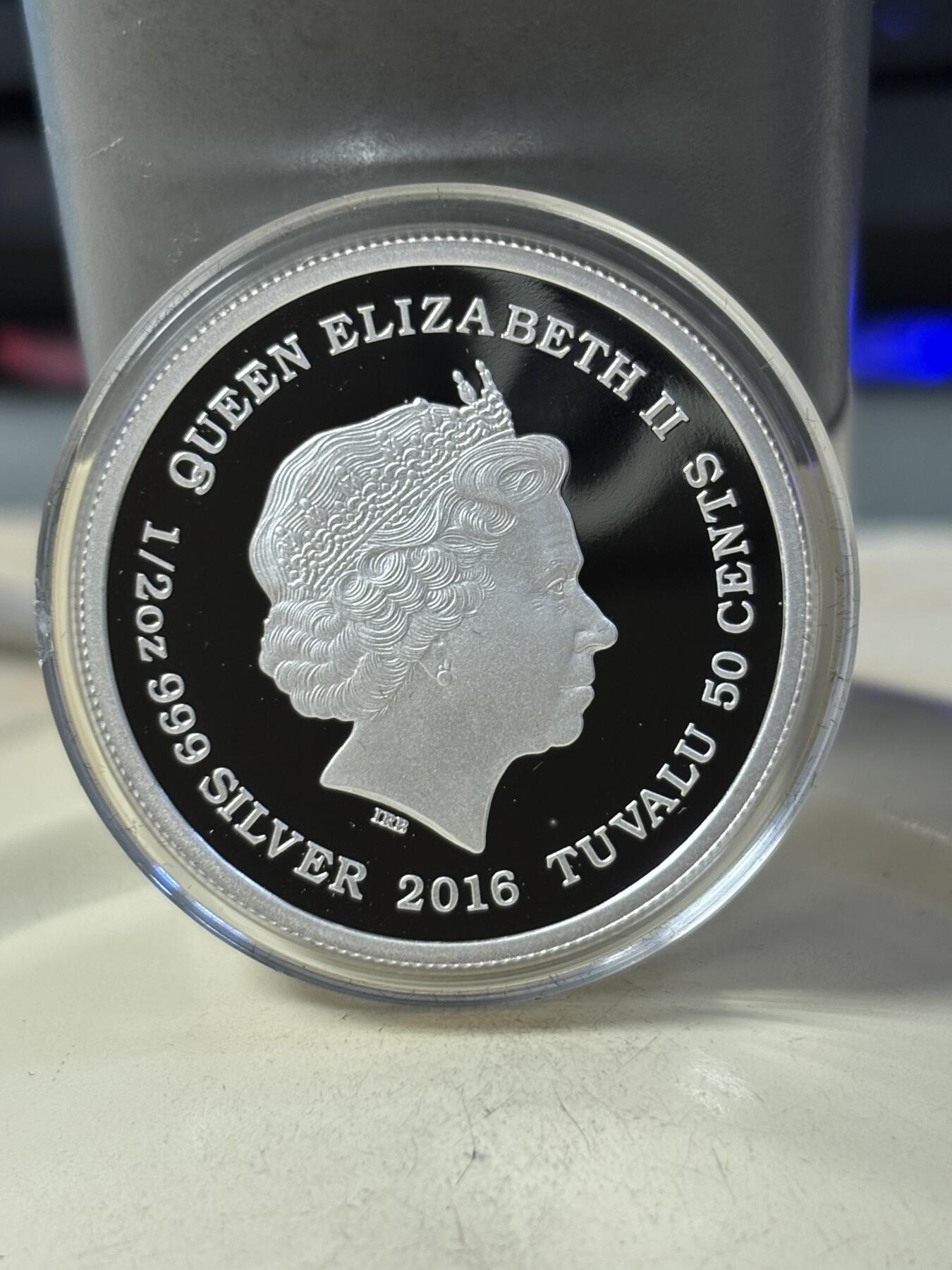 第191期拍卖 图瓦卢2016年幼崽系列美洲虎半盎司彩色纪念银币，999银，发行5000枚