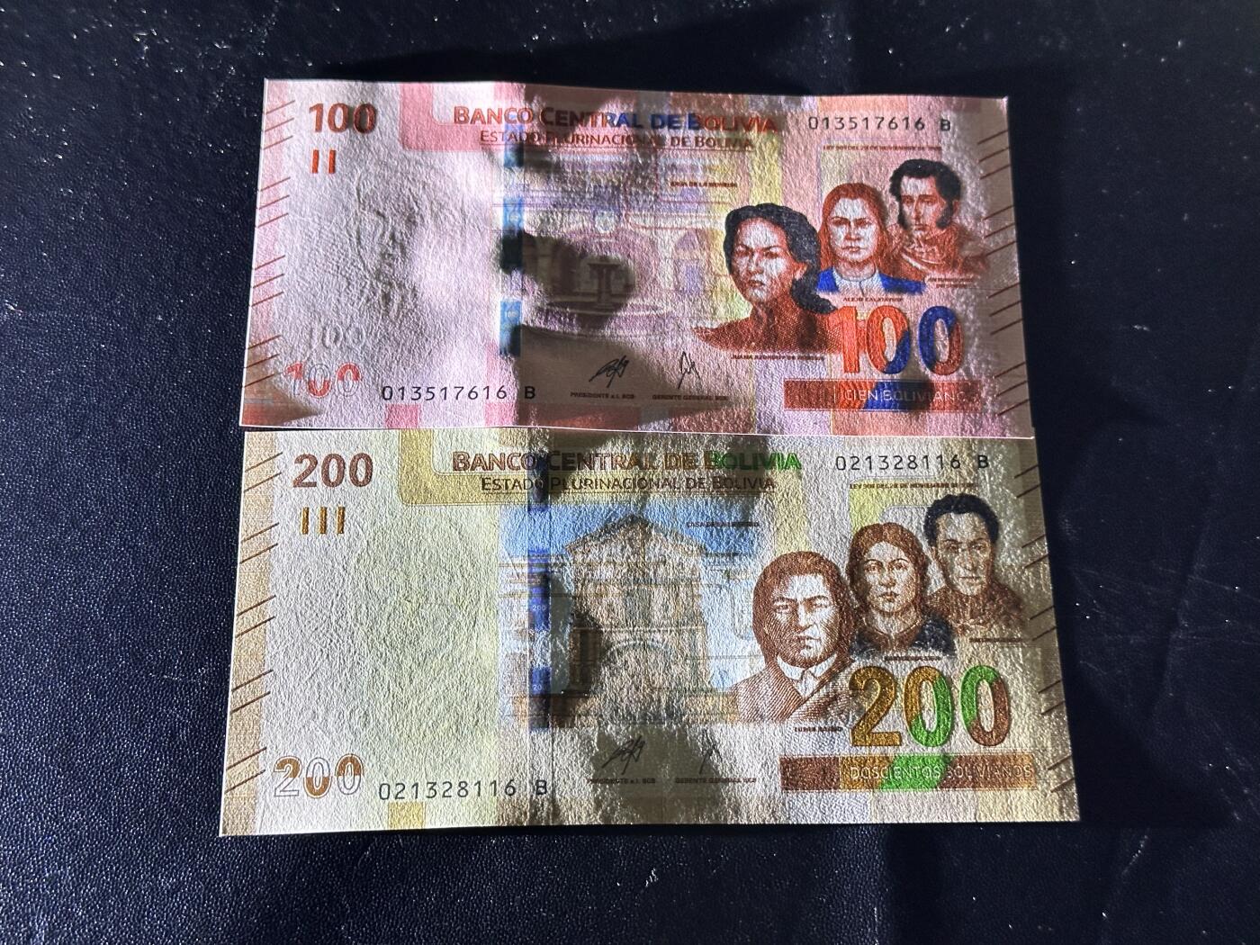 《外钞收藏家》第六百一十一期（农历新年第一场/快递恢复正常再发货）（长期征集拍品、欢迎藏友们联系合作） 玻利维亚100和200面额 2张一起 全新 尾（16）