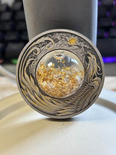 第191期拍卖 - 图瓦卢2024年阿利坎特凤凰2盎司镶嵌金银颗粒纪念银币，999银，发行2500枚