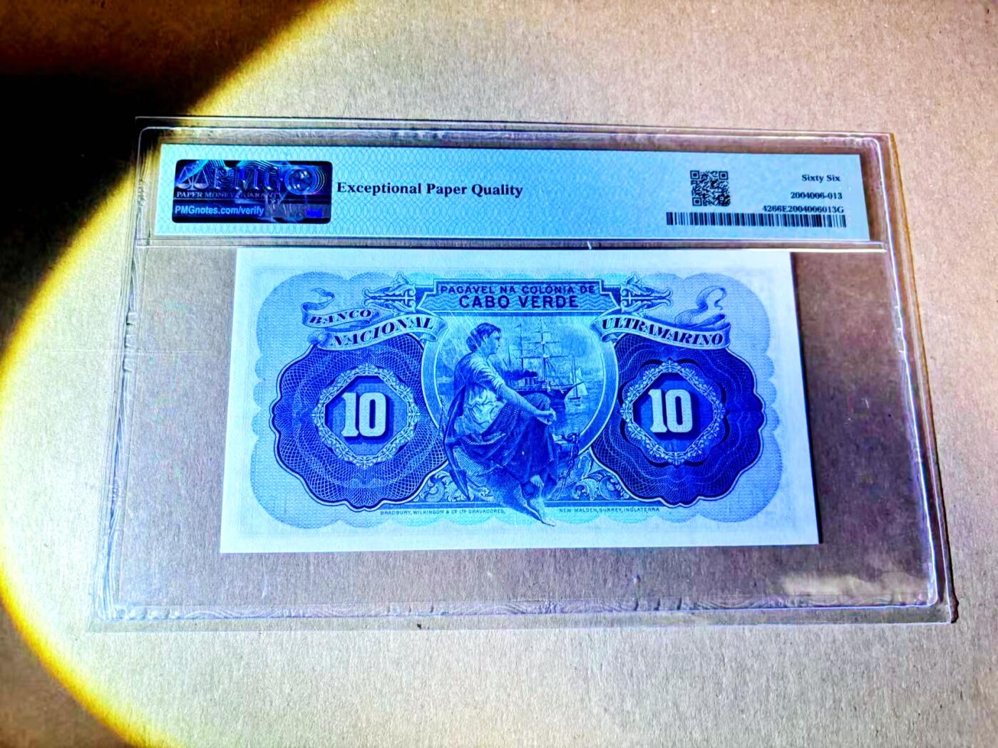 【Blue Auction】世界纸币精拍第787期——18级TOP拍卖/信誉/品质/专业/高效💫  【冠军分仅2张非常罕见】佛得角 1945年10埃斯库多 BWC出品 正面为葡萄牙著名航海家迪亚斯 背面美女远眺船队经典画面 PMG66EPQ 该套仅最小面值5埃斯库多常见 其余高分难求