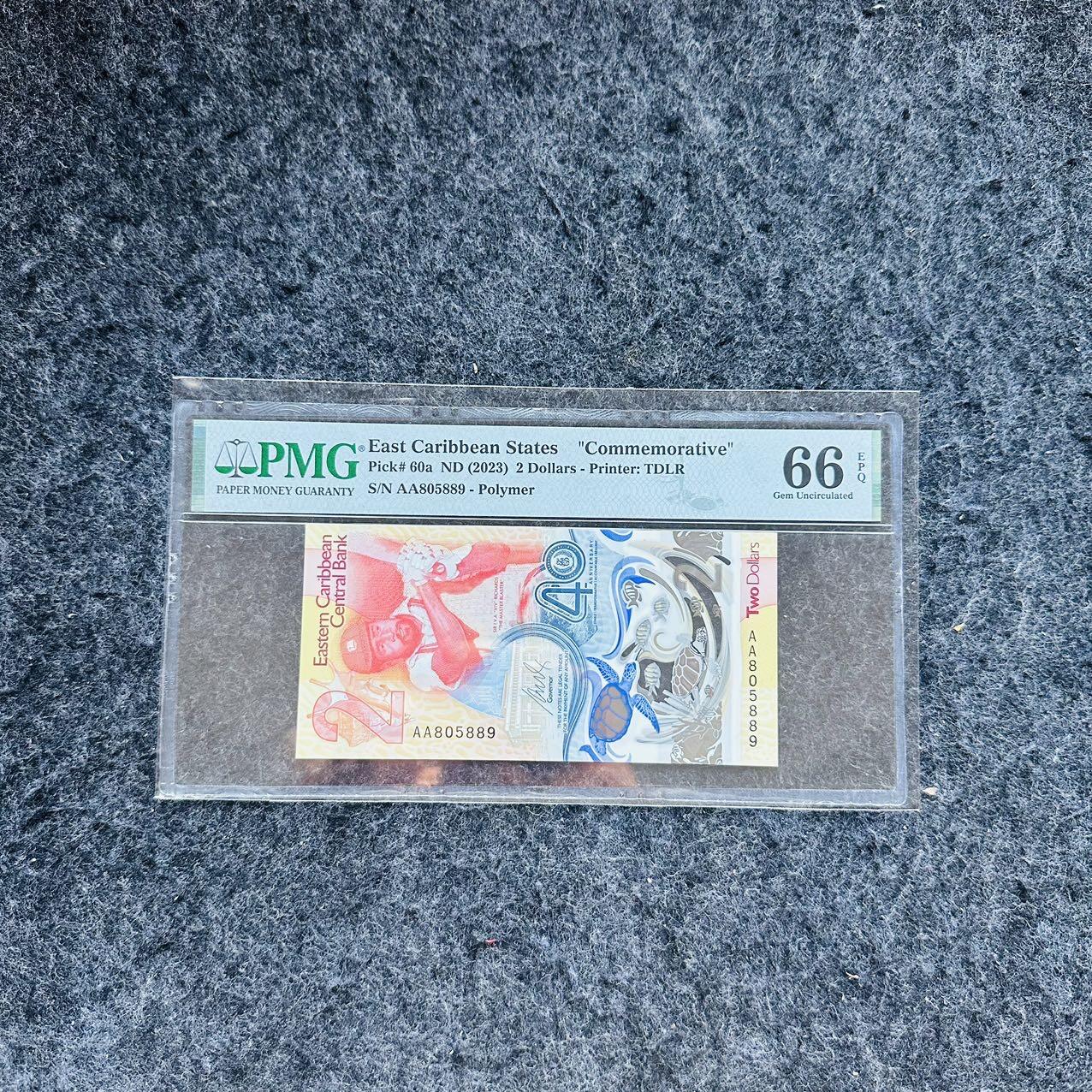 🇨🇳🇺🇳¥ ¥2026🐎新年塑料钞评级钞 东加勒比2023年2元，纪念钞，IBNS获奖钞，AA首发冠，(AA805889)