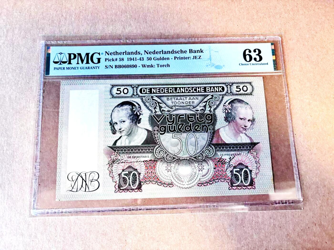 【Blue Auction】世界纸币精拍第787期——18级TOP拍卖/信誉/品质/专业/高效💫  【倒置号】荷兰1941-43年50盾 BB冠 经典吃牡蛎的小女孩 PMG63